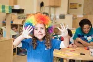 Kiddie Academy student learns through play at the sensory station during Read Across America Week.
