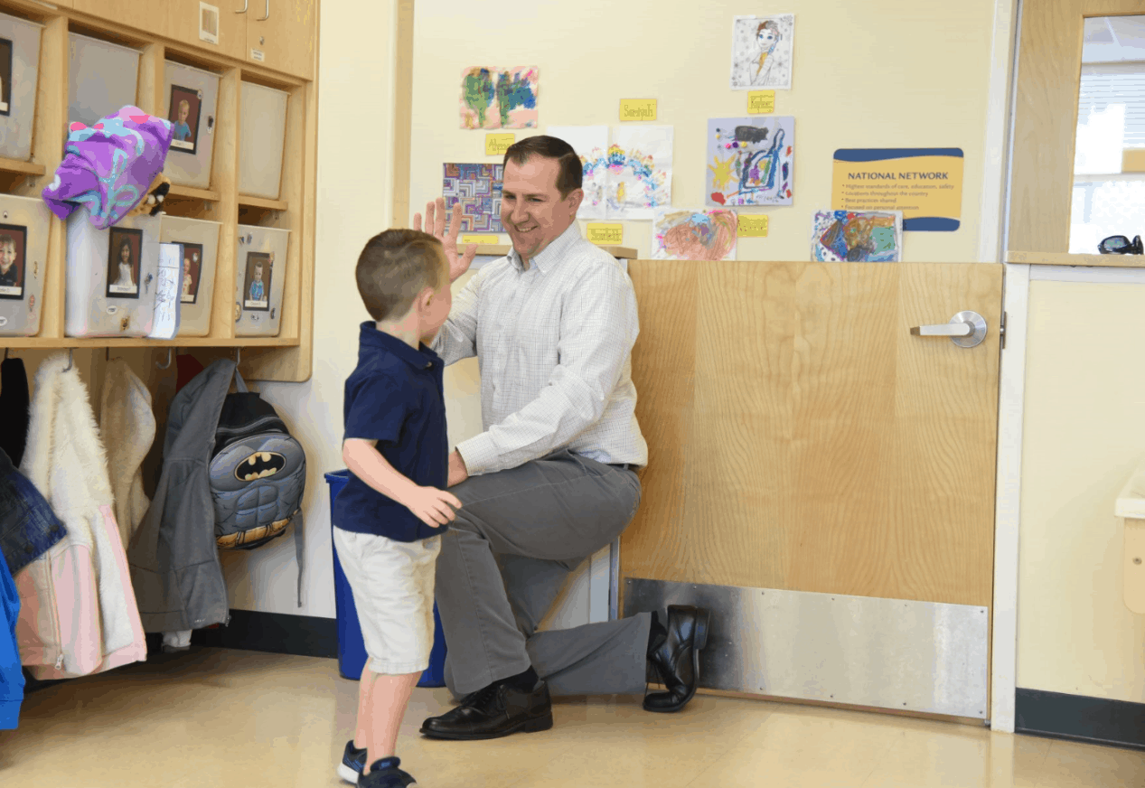 Dad dropping off son