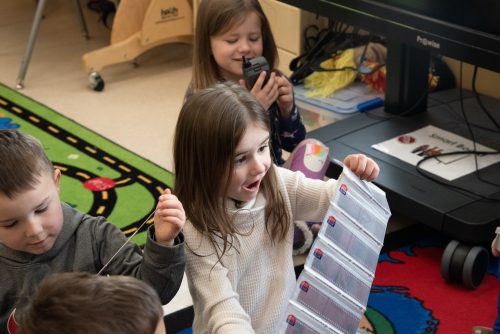 Kiddie Academy students explore film strips