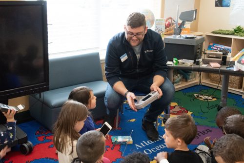 students explore game boy