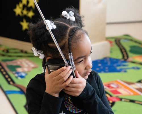 Kiddie Academy kids explore portable tv