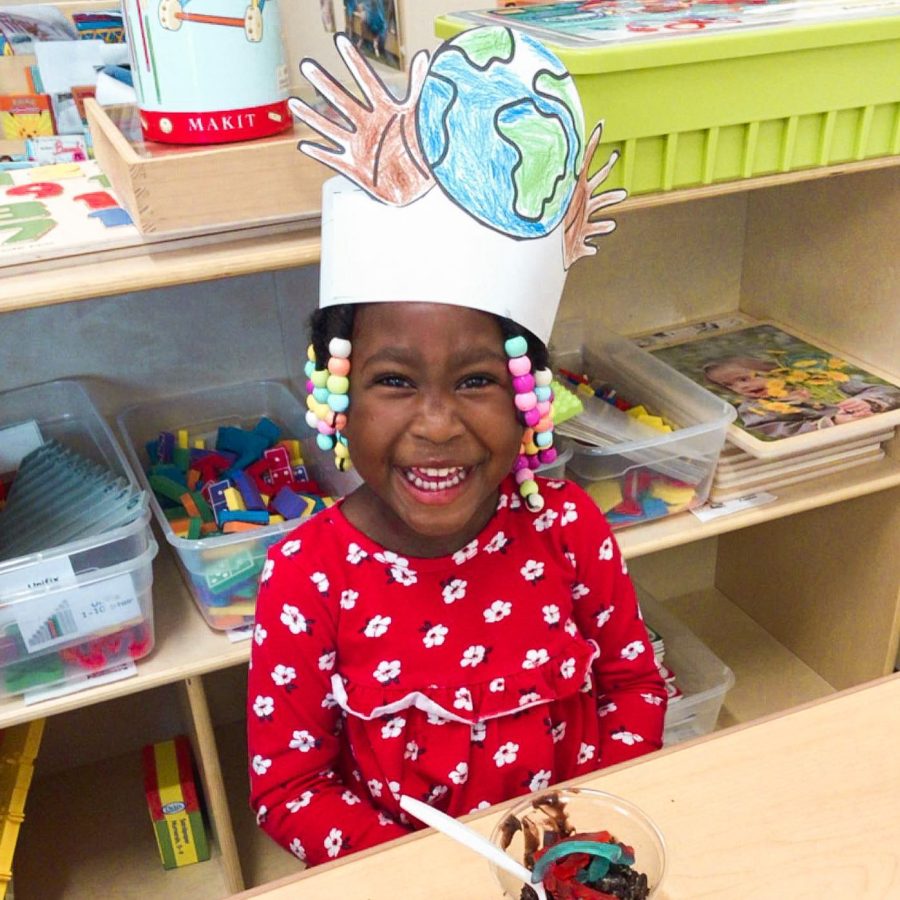 Kiddie Academy student wearing Earth hat